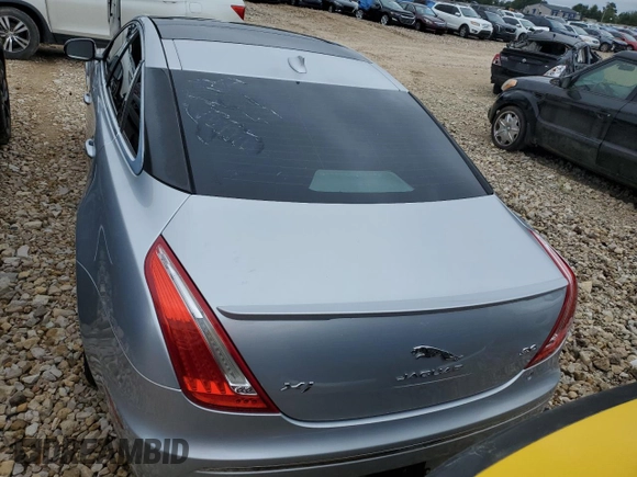 2015 Jaguar XJ with VIN SAJWA1CZ1F8V89918, listed as a Copart auction lot 69972394 with 92,030 mi miles and Clean Title. Bid and sale history available at carsss.com. Image 6.