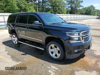 2017 Chevrolet Tahoe LT with VIN 1GNSCBKC2HR312256, listed as a Copart auction lot 55736935 with 175,072 mi miles and Salvage title. Bid and sale history available at DreamBid. Image 4.