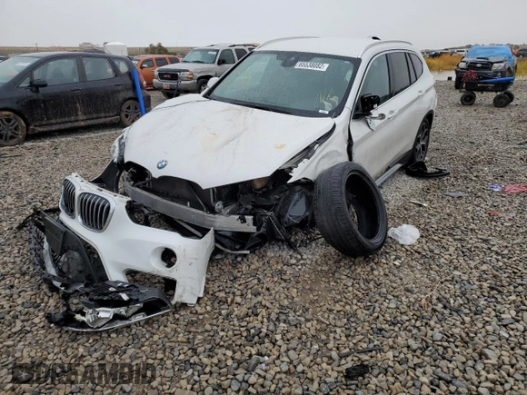 2019 BMW X1 sDrive28i with VIN WBXHU7C53K5L12037, listed as a Copart auction lot 65538082 with Not Provided miles and . Bid and sale history available at DreamBid. Image 2.