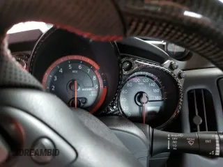 2015 Nissan 370Z Nismo z VIN JN1AZ4EH1FM441060, wystawiony jako Copart lot #53423725 z przebiegiem Nie podano mil oraz Szkody całkowita. Historia ofert i sprzedaży dostępna na DreamBid. Obrazek 9.