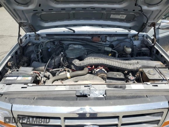 1993 Ford F-150 z VIN 2FTDF15N4PCA95188, wystawiony jako Copart lot #57810385 z przebiegiem 195 093 mil mil oraz Szkoda całkowita • Salvage title. Historia ofert i sprzedaży dostępna na DreamBid. Obrazek 11.