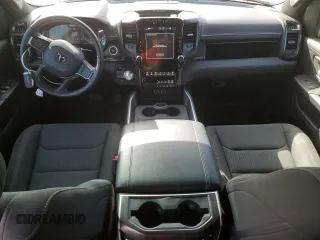 2023 Ram 1500 Limited with VIN 1C6SRFHT1PN576104, listed as a Copart auction lot 48064355 with 23,874 mi miles and Salvage title. Bid and sale history available at DreamBid. Image 8.