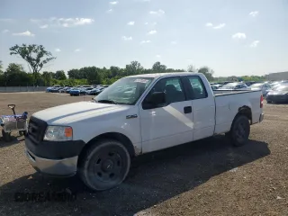 2007 Ford F-150 STX with VIN 1FTRX12W47FB00233, listed as a Copart auction lot 61870565 with 205,846 mi miles and Clean title. Bid and sale history available at DreamBid. Image 1.