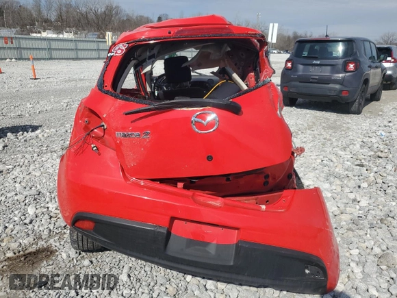 2014 Mazda 2 Sport with VIN JM1DE1KY2E0185106, listed as a Copart auction lot 47486205 with Not Provided miles and Salvage Title. Bid and sale history available at DreamBid. Image 6.