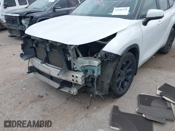 2023 Toyota Highlander L with VIN 5TDKDRAH9PS039652, listed as a IAAI auction lot 41948320 with 127,310 mi miles and . Bid and sale history available at DreamBid. Image 17.