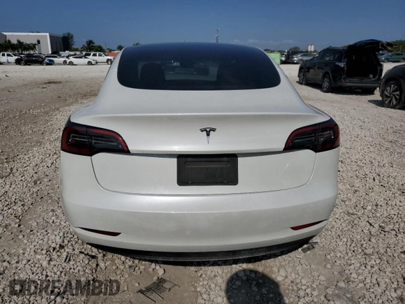 2023 Tesla Model 3 with VIN 5YJ3E1EA6PF510323, listed as a Copart auction lot 52094495 with 115,928 mi miles and Salvage Title. Bid and sale history available at DreamBid. Image 6.