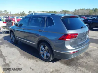 2021 Volkswagen Tiguan SE with VIN 3VV2B7AX2MM001713, listed as a IAAI auction lot 41357396 with 81,872 mi miles. Bid and sale history available at carsss.com. Image 3.