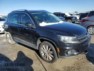 2015 Volkswagen Tiguan SE z VIN WVGBV7AX9FW516731, wystawiony jako Copart lot #49508815 z przebiegiem 172 072 mil mil oraz Szkoda całkowita • Salvage title. Historia ofert i sprzedaży dostępna na DreamBid. Obrazek 4.