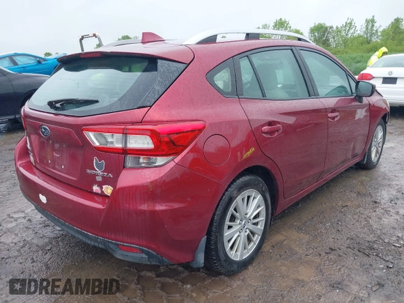 2018 Subaru Impreza Premium z VIN 4S3GTAB63J3720910, wystawiony jako IAAI lot #42331367 z przebiegiem 59 216 mil mil oraz . Historia ofert i sprzedaży dostępna na DreamBid. Obrazek 4.