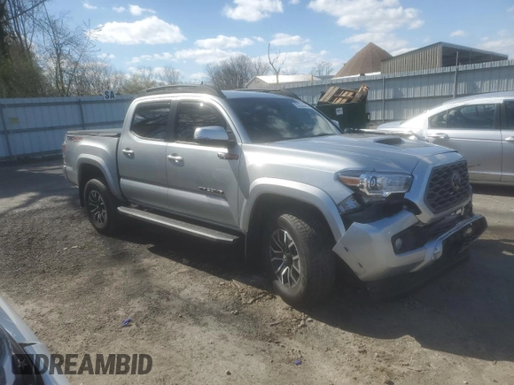 2023 Toyota Tacoma SR z VIN 3TMCZ5AN6PM539899, wystawiony jako Copart lot #52238445 z przebiegiem 30 070 mil mil oraz Szkoda całkowita • Salvage title. Historia ofert i sprzedaży dostępna na DreamBid. Obrazek 4.