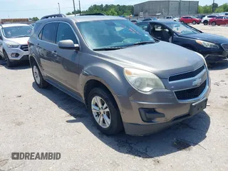2012 Chevrolet Equinox 1LT z VIN 2GNALDEK7C6308217, wystawiony jako IAAI lot #42464082 z przebiegiem 241 628 mil mil oraz . Historia ofert i sprzedaży dostępna na DreamBid. Obrazek 1.