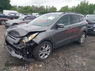 2013 Ford Escape SEL with VIN 1FMCU9HX4DUC75565, listed as a IAAI auction lot 42574351 with 180,876 mi miles and . Bid and sale history available at DreamBid. Image 18.