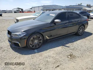 2018 BMW 5 Series M550i xDrive with VIN WBAJB9C54JG464232, listed as a Copart auction lot 58090155 with 96,593 mi miles and Salvage title. Bid and sale history available at DreamBid. Image 1.