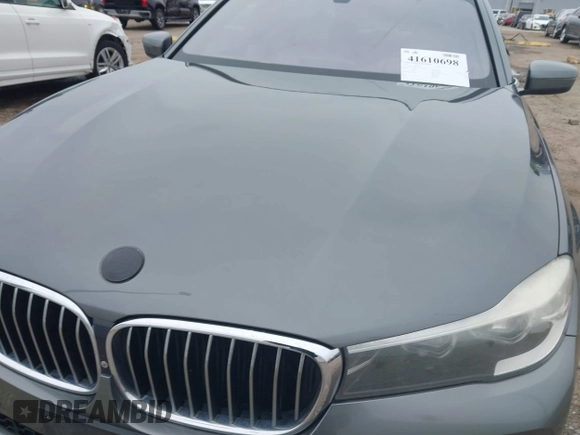 2016 BMW 7 Series 740i with VIN WBA7E2C56GG546920, listed as a IAAI auction lot 41610698 with 119,689 mi miles. Bid and sale history available at carsss.com. Image 6.