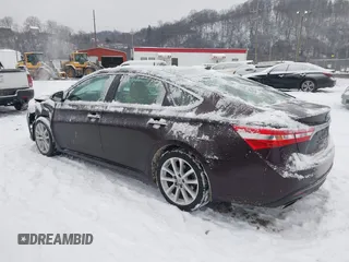 2014 Toyota Avalon Limited with VIN 4T1BK1EB1EU106004, listed as a IAAI auction lot 41341771 with 86,608 mi miles and . Bid and sale history available at DreamBid. Image 3.