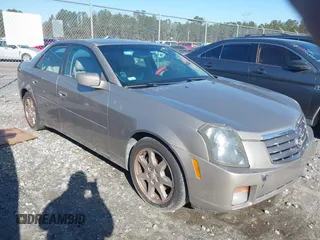 2003 Cadillac CTS with VIN 1G6DM57N730143376, listed as a IAAI auction lot 41688381 with 151,857 mi miles. Bid and sale history available at carsss.com. Image 1.
