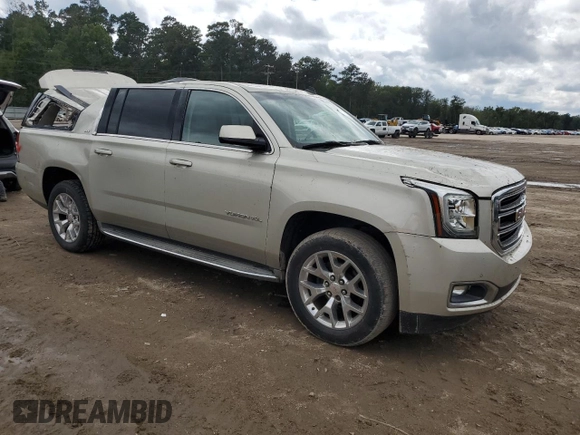 2015 GMC Yukon XL SLT with VIN 1GKS1HKC5FR168608, listed as a Copart auction lot 71564384 with 197,538 mi miles and Salvage Title. Bid and sale history available at carsss.com. Image 4.