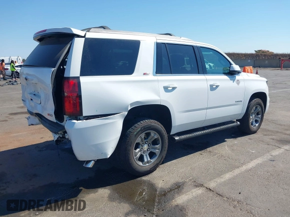2017 Chevrolet Tahoe LT with VIN 1GNSKBKC4HR356570, listed as a IAAI auction lot 42762093 with 146,679 mi miles and . Bid and sale history available at DreamBid. Image 4.