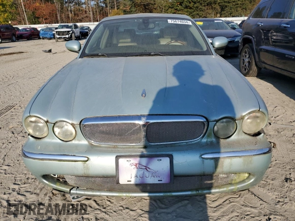 2005 Jaguar XJ with VIN SAJWA79C15SG48962, listed as a Copart auction lot 75674034 with 0 mi miles and Salvage Title. Bid and sale history available at carsss.com. Image 5.