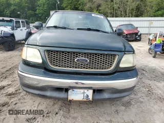 2003 Ford F-150 XL with VIN 1FTRX07WX3KB99581, listed as a Copart auction lot 56907765 with 232,597 mi miles and Salvage title. Bid and sale history available at DreamBid. Image 5.