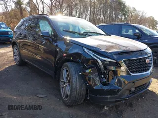 2020 Cadillac XT4 AWD Sport with VIN 1GYFZFR48LF076263, listed as a IAAI auction lot 41738834 with 33,965 mi miles and . Bid and sale history available at carsss.com. Image 1.