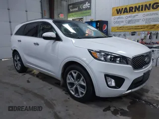 2017 Kia Sorento SX with VIN 5XYPKDA59HG227588, listed as a IAAI auction lot 41586229 with 57,845 mi miles and . Bid and sale history available at DreamBid. Image 1.