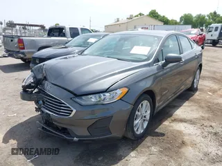2019 Ford Fusion SE with VIN 3FA6P0LU3KR174108, listed as a IAAI auction lot 42094264 with 87,700 mi miles and . Bid and sale history available at carsss.com. Image 2.