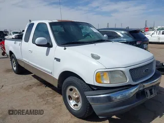 1999 Ford F-150 with VIN 1FTZX1720XKB31945, listed as a IAAI auction lot 42123984 with 187,766 mi miles and . Bid and sale history available at DreamBid. Image 1.