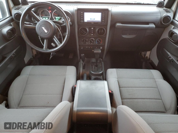 2007 Jeep Wrangler Unlimited Rubicon с VIN 1J8GA691X7L191115, выставлен на аукционе Copart как лот 87523925 с пробегом 85 709 миль миль и Списание • Salvage title. История ставок и продаж доступна на DreamBid. Изображение 8.