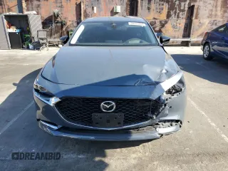 2023 Mazda 3 Premium Plus with VIN 3MZBPBEY5PM374977, listed as a Copart auction lot 70642804 with 9,029 mi miles and Salvage Title. Bid and sale history available at DreamBid. Image 5.