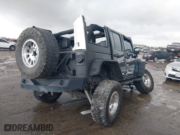 2018 Jeep Wrangler Unlimited Rubicon Recon with VIN 1C4BJWFG3JL840951, listed as a IAAI auction lot 41474583 with 121,971 mi miles and . Bid and sale history available at DreamBid. Image 4.