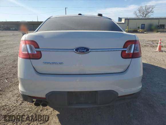 2011 Ford Taurus SE with VIN 1FAHP2DWXBG173095, listed as a Copart auction lot 89089415 with 136,305 mi miles and Clean Title. Bid and sale history available at DreamBid. Image 6.