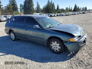 1997 Honda Accord LX with VIN 1HGCE1827VA005872, listed as a Copart auction lot 73034134 with 189,066 mi miles and Salvage Title. Bid and sale history available at carsss.com. Image 4.