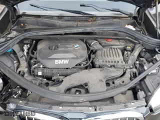 2017 BMW X1 xDrive28i with VIN WBXHT3C35H5F74213, listed as a IAAI auction lot 41589180 with 58,990 mi miles. Bid and sale history available at carsss.com. Image 10.