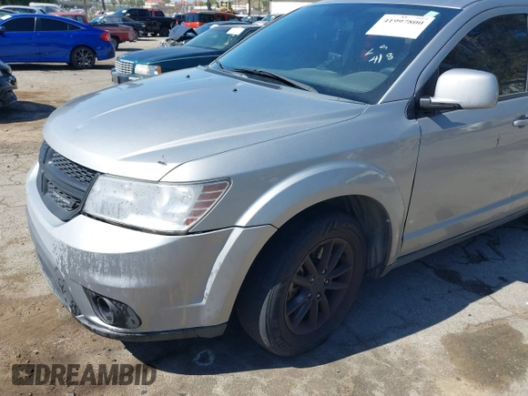 2017 Dodge Journey SXT z VIN 3C4PDCBG0HT530742, wystawiony jako IAAI lot #41997800 z przebiegiem 189 186 mil mil oraz . Historia ofert i sprzedaży dostępna na DreamBid. Obrazek 6.