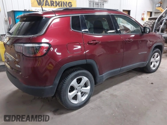 2021 Jeep Compass Altitude with VIN 3C4NJDBB8MT547261, listed as a IAAI auction lot 42066421 with 99,188 mi miles and . Bid and sale history available at DreamBid. Image 4.