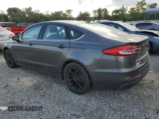 2020 Ford Fusion SE with VIN 3FA6P0HD0LR184251, listed as a Copart auction lot 57325205 with 99,142 mi miles and Salvage title. Bid and sale history available at DreamBid. Image 2.