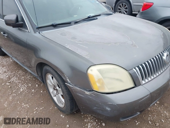 2006 Mercury Montego Luxury z VIN 1MEFM40166G617559, wystawiony jako IAAI lot #41768007 z przebiegiem 234 542 mil mil oraz . Historia ofert i sprzedaży dostępna na DreamBid. Obrazek 6.