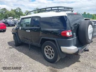 2013 Toyota FJ Cruiser with VIN JTEBU4BF2DK173157, listed as a IAAI auction lot 39718611 with 178,886 mi miles. Bid and sale history available at carsss.com. Image 3.
