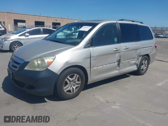 2006 Honda Odyssey EX-L with VIN 5FNRL38766B038599, listed as a IAAI auction lot 41989217 with 164,118 mi miles. Bid and sale history available at carsss.com. Image 2.