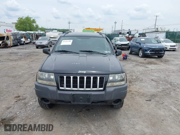 2004 Jeep Grand Cherokee Laredo z VIN 1J4GW48S54C198115, wystawiony jako IAAI lot #42351240 z przebiegiem 189 416 mil mil oraz . Historia ofert i sprzedaży dostępna na DreamBid. Obrazek 13.