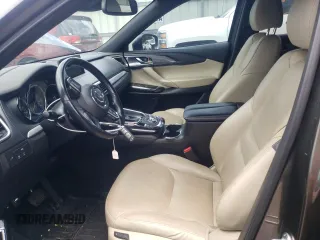 2018 Mazda CX-9 Grand Touring с VIN JM3TCADY9J0205299, выставлен на аукционе Copart как лот 60306095 с пробегом 113 766 миль миль и Списание • Salvage title. История ставок и продаж доступна на DreamBid. Изображение 7.
