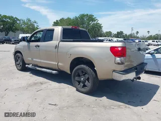 2007 Toyota Tundra SR5 with VIN 5TFRT54167X007311, listed as a IAAI auction lot 41937779 with 155,756 mi miles. Bid and sale history available at carsss.com. Image 3.