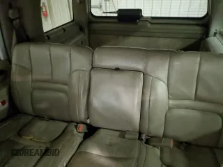 2000 Cadillac Escalade z VIN 1GYEK63R0YR185780, wystawiony jako Copart lot #80620994 z przebiegiem 16 717 mil mil oraz Szkody całkowita. Historia ofert i sprzedaży dostępna na DreamBid. Obrazek 10.