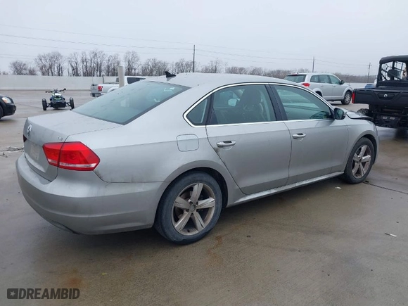 2014 Volkswagen Passat Wolfsburg Ed with VIN 1VWAT7A32EC028320, listed as a IAAI auction lot 41456457 with 173,581 mi miles. Bid and sale history available at carsss.com. Image 4.
