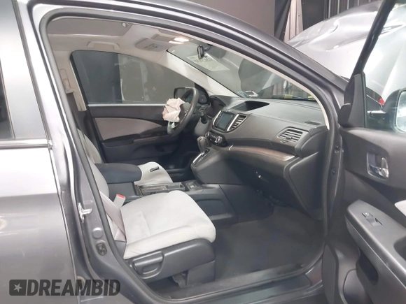 2015 Honda CR-V EX with VIN 2HKRM4H58FH619184, listed as a IAAI auction lot 42021030 with 102,948 mi miles and . Bid and sale history available at DreamBid. Image 5.