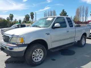 2001 Ford F-150 XL with VIN 1FTRX18L91KF29881, listed as a IAAI auction lot 42021554 with 199,041 mi miles. Bid and sale history available at carsss.com. Image 6.