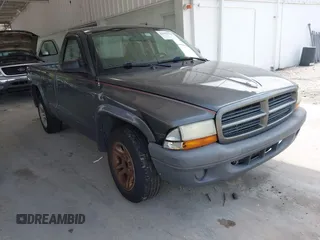 2003 Dodge Dakota z VIN 1D7FL16XX3S296008, wystawiony jako IAAI lot #42393154 z przebiegiem 196 734 mil mil oraz . Historia ofert i sprzedaży dostępna na DreamBid. Obrazek 1.