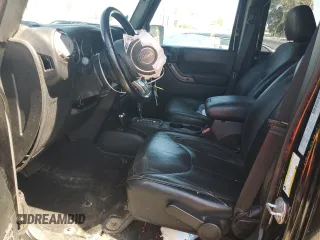 2018 Jeep Wrangler JK Unlimited Altitude with VIN 1C4BJWEG5JL820816, listed as a Copart auction lot 71212614 with 76,630 mi miles and Salvage Title. Bid and sale history available at carsss.com. Image 7.