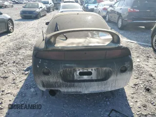 1998 Mitsubishi Eclipse GS-T with VIN 4A3AK54F8WE087052, listed as a Copart auction lot 77439464 with 119,881 mi miles and Salvage Title. Bid and sale history available at carsss.com. Image 6.
